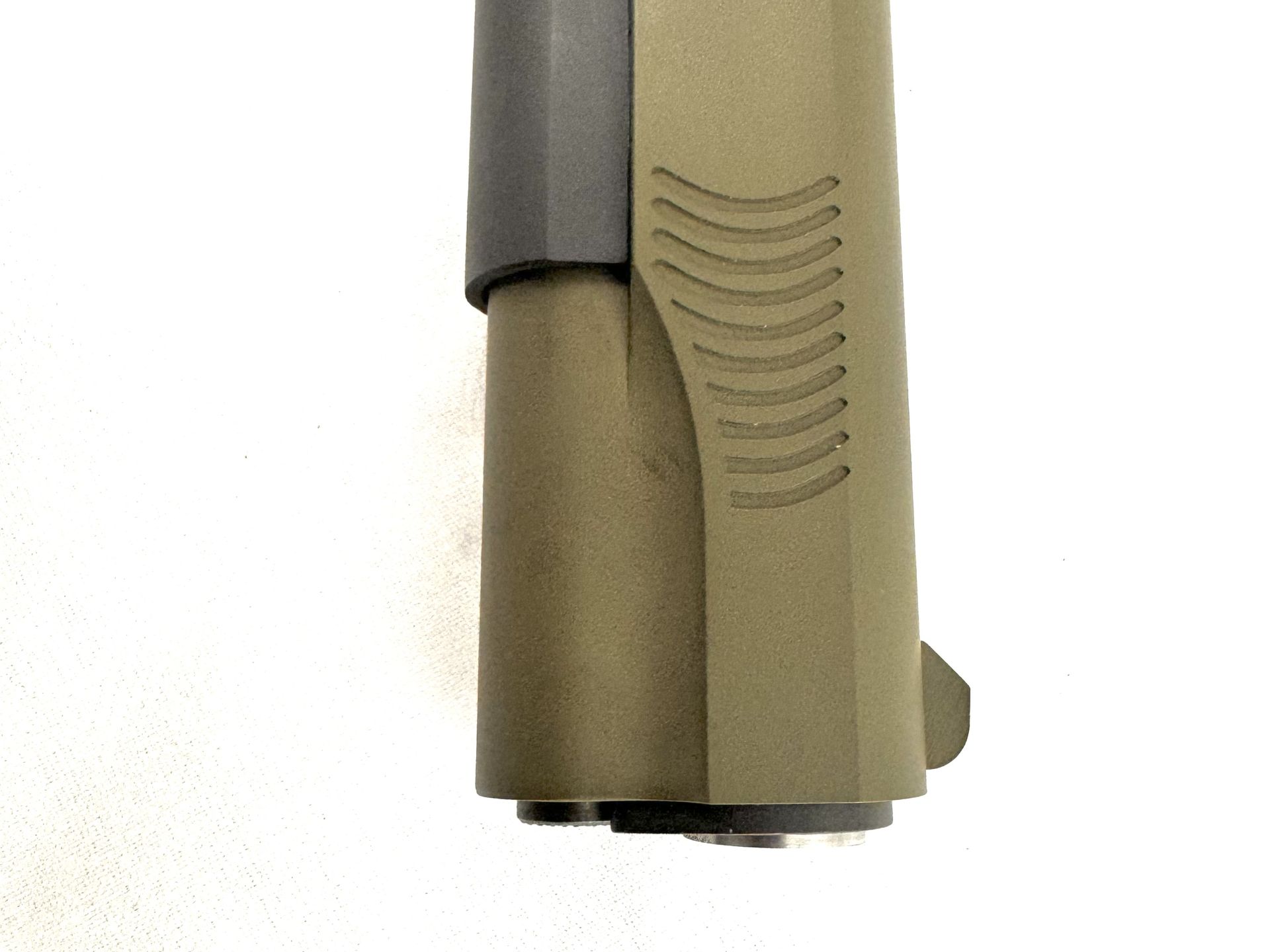 OD green machined suppressor close-up
